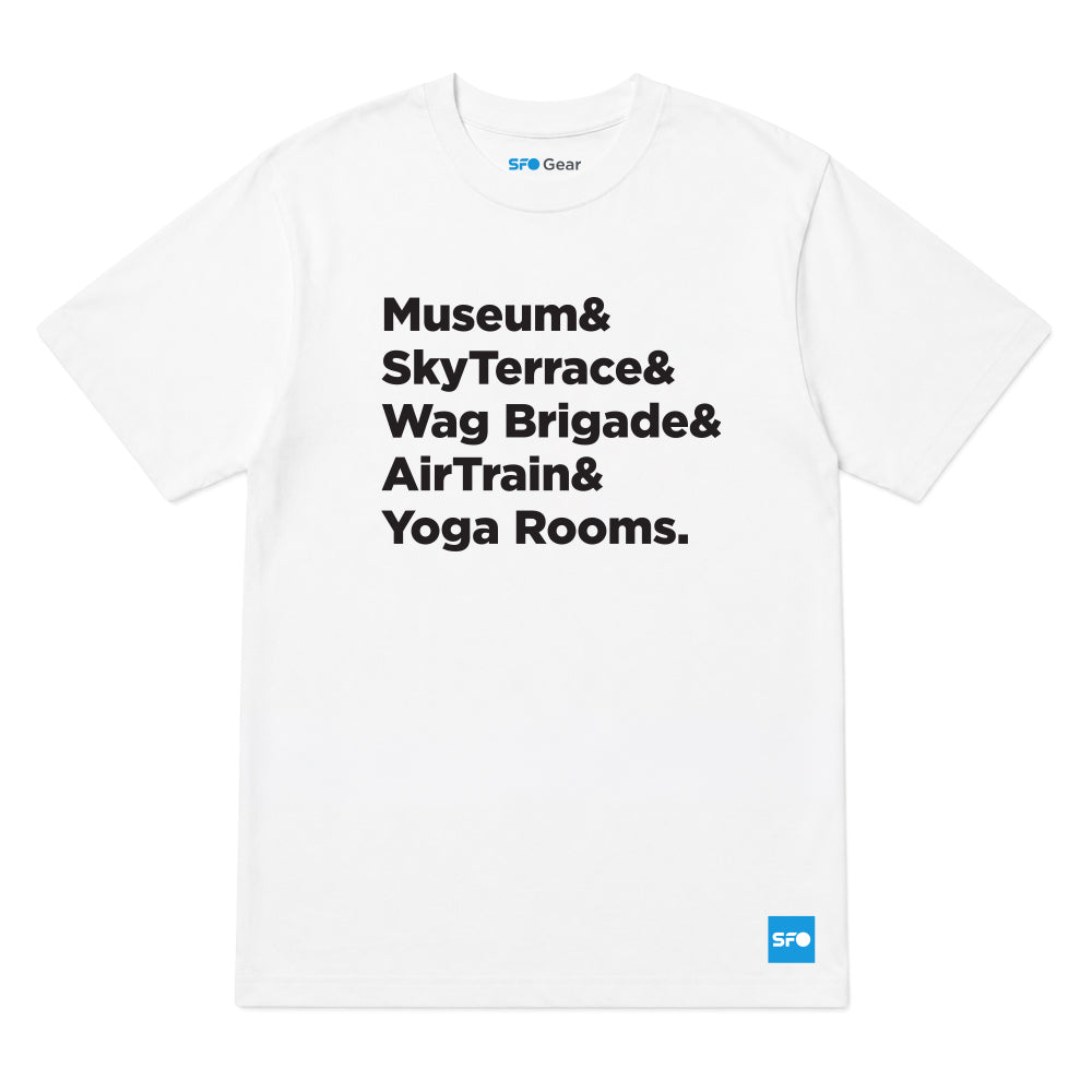 A white short-sleeve crewneck t-shirt with black printed text listing 'Museum& SkyTerrace& Wag Brigade& AirTrain& Yoga Rooms.' on the front, featuring a small blue 'SFO Gear' logo on the bottom right hem and inside the collar.