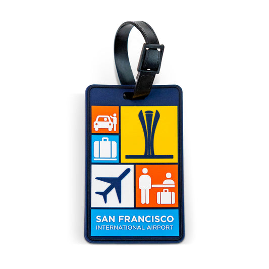 A San Francisco International Airport luggage tag featuring a colorful graphic with airport icons and a black strap, shown on a plain white background.